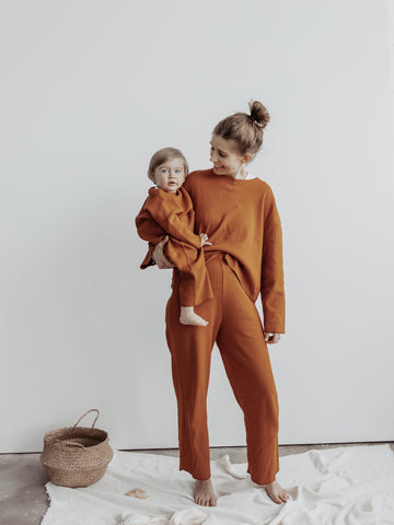 Mother and Babyboy in Matching Pants and Sweater in Cinnamon, barefoot 