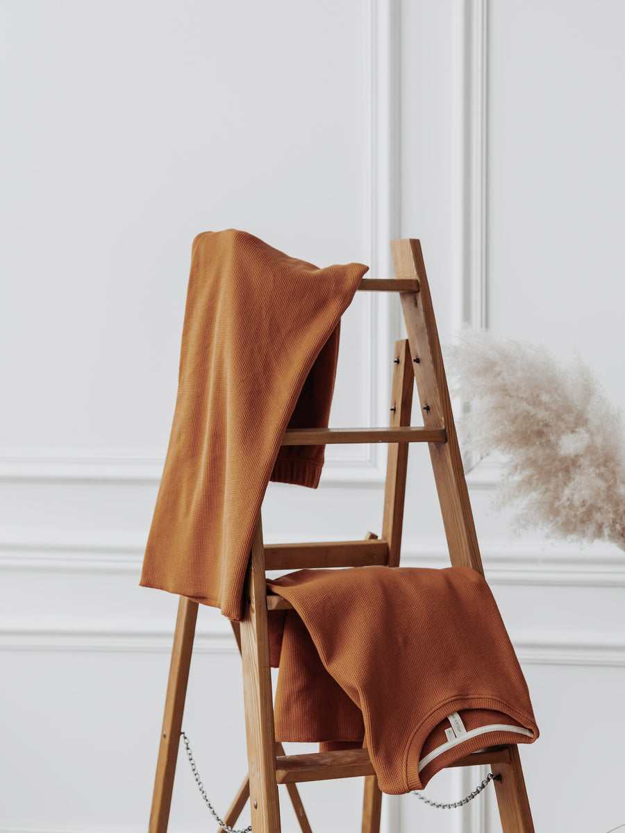 Matching Pants and Sweater on Ladder, Boho Photostudio