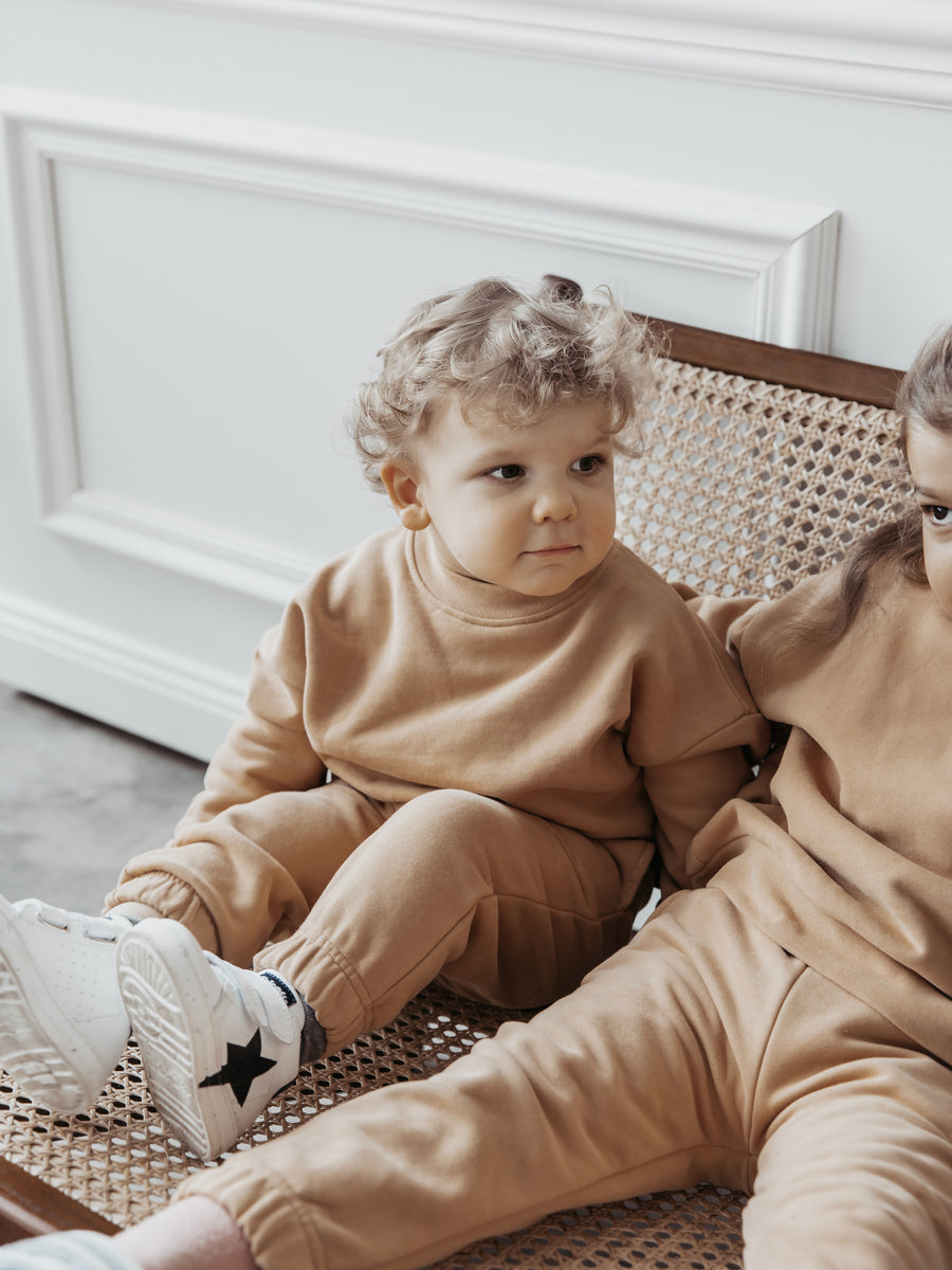 Babyboy in Mini me Tracksuit Toffee, Siblings in Matching Outfits beige