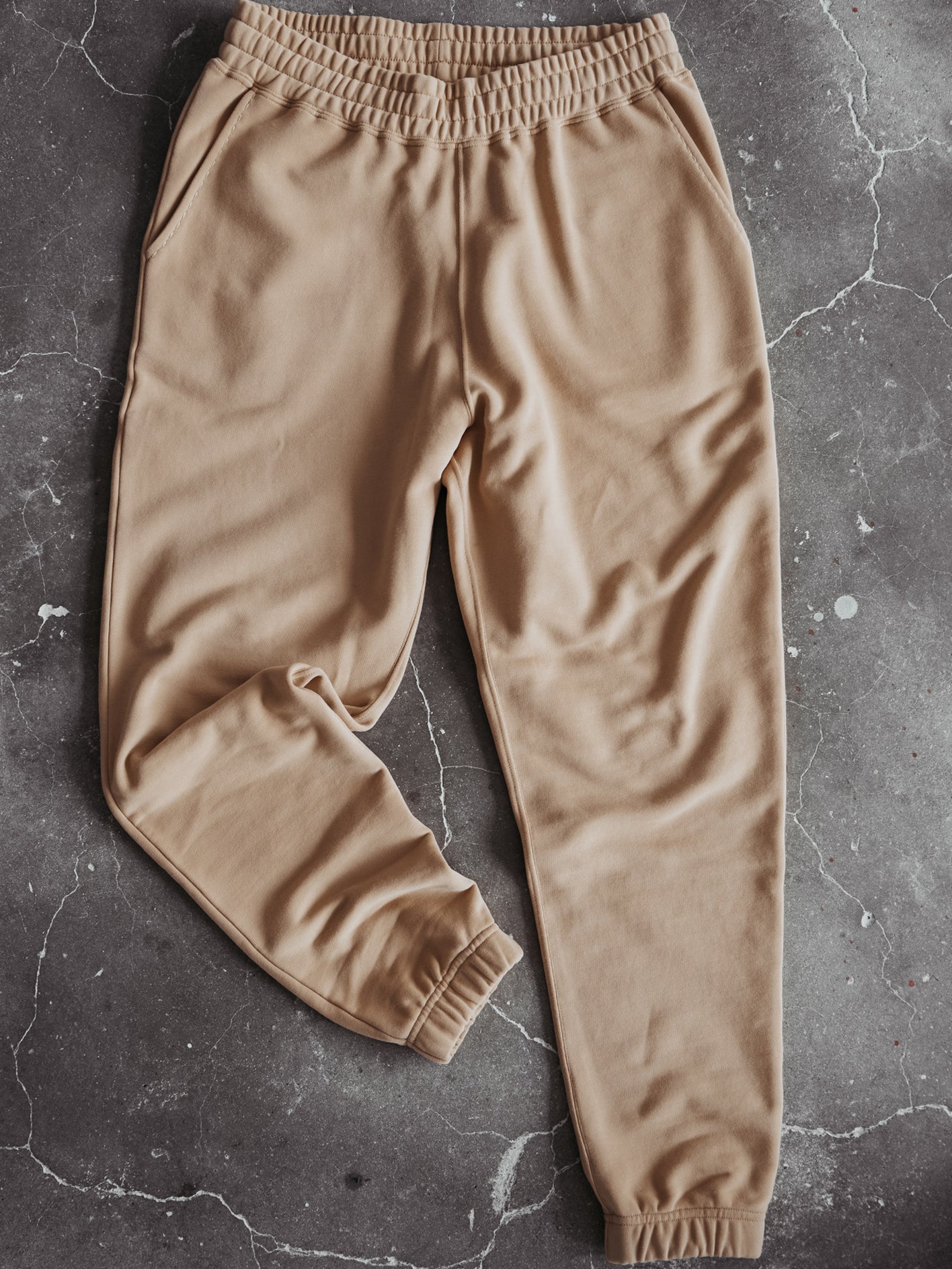 Sweatpants on floor, Trackpants in beige, Womenfashion, Menfashion, Kidsfashion